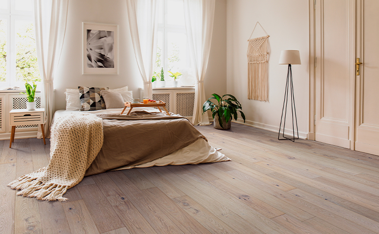 farmhouse hardwood flooring in bedroom